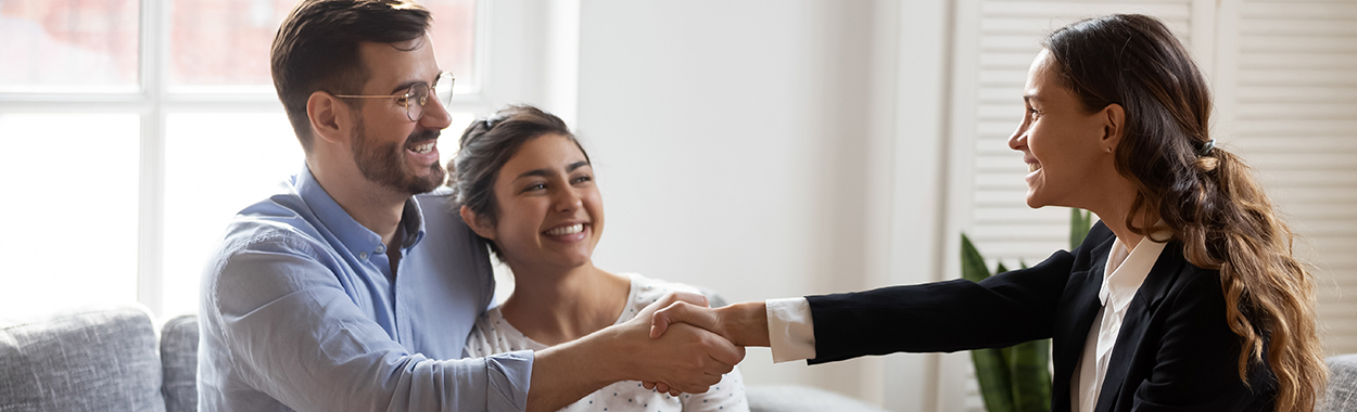 Buyers' Agent Shaking Hands with Client